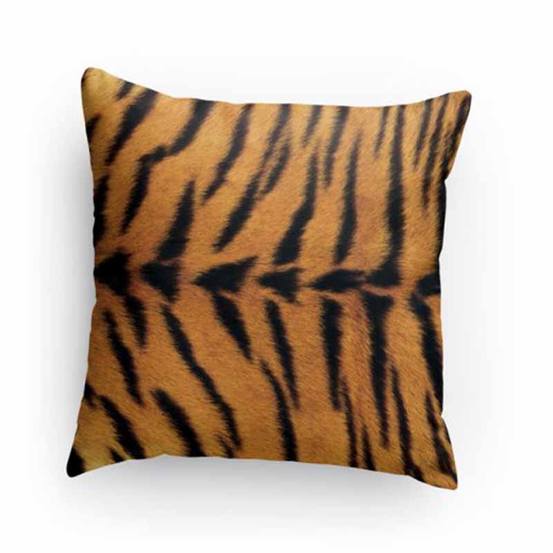 A square-shaped throw pillow with a tiger print pattern.