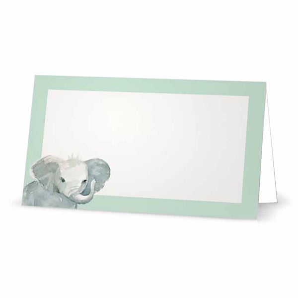 Pastel green baby elephant place cards in tent style.