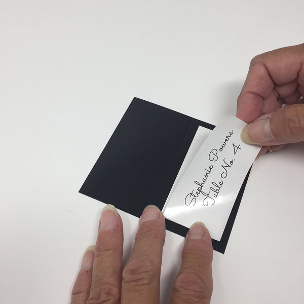 How to apply White Gloss label onto place card with border.
